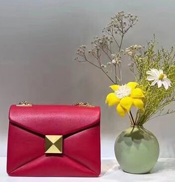 red designer bag