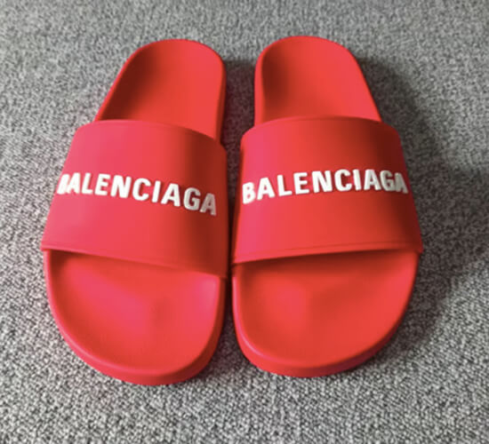 Close-up view of a Balenciaga slides dupe, highlighting the detailed logo and quality material