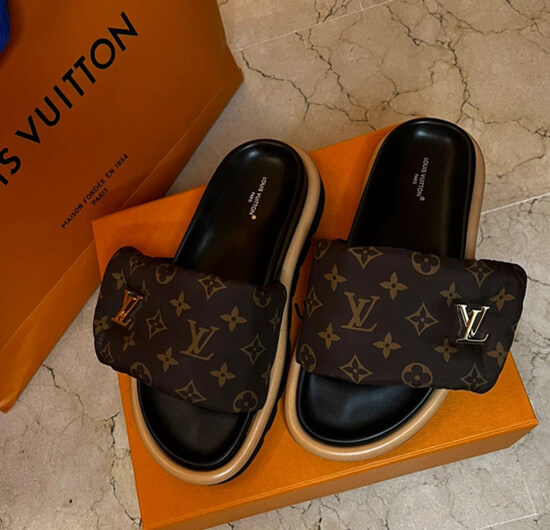 Stylish Louis Vuitton slides dupe featuring the signature LV monogram
