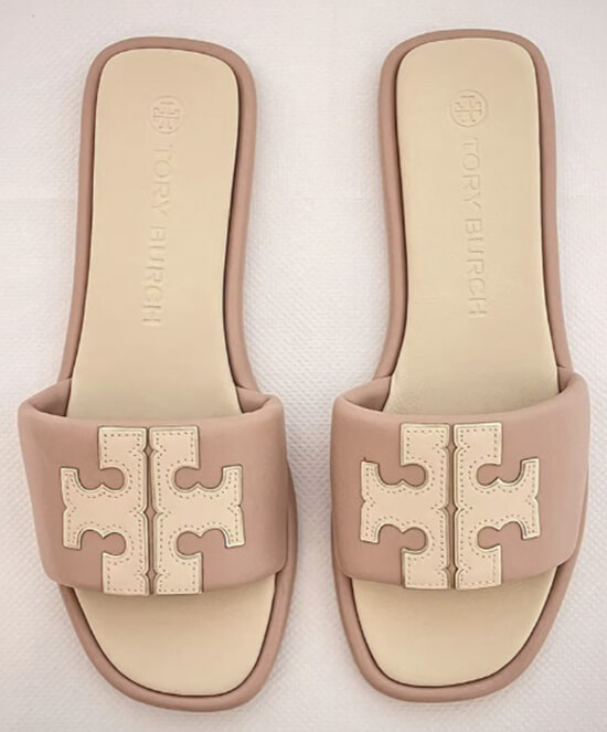 Close-up view of the Tory Burch sandals dupe, showcasing the fine detailing on the logo and straps