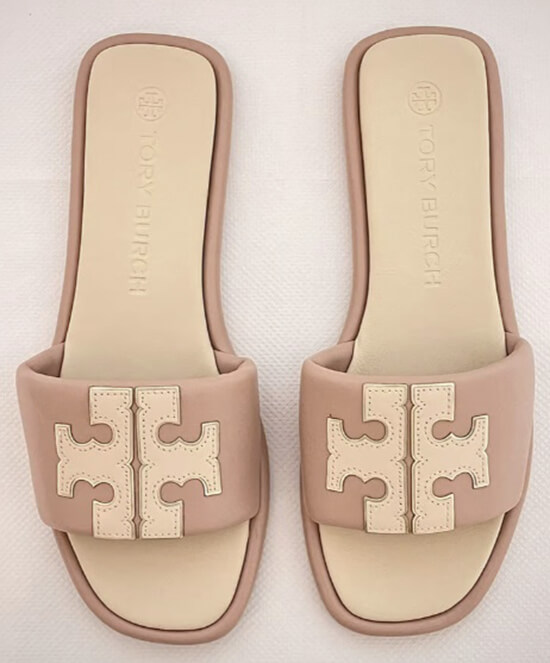Close-up view of the Tory Burch sandals dupe, showcasing the fine detailing on the logo and straps