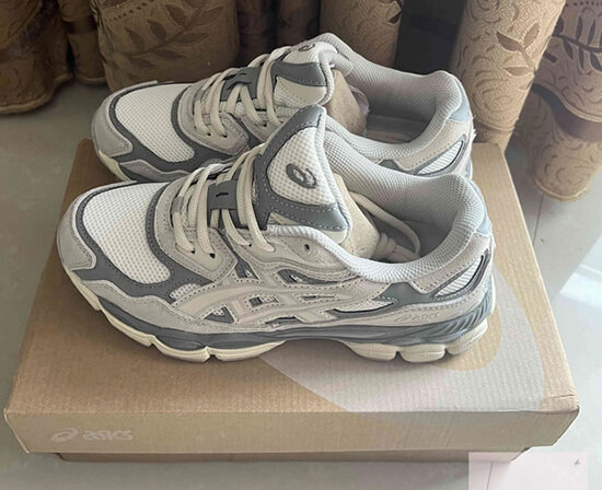 Trendy Replicas: Asics NYC sneakers styled with trendy outfits, demonstrating their versatility