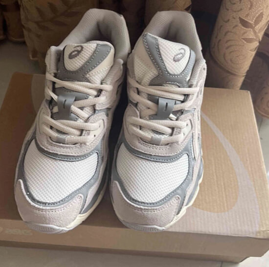 Affordable Luxury: Asics Gel dupes with a focus on the logo, embodying affordable fashion
